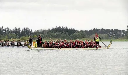  ?? MATTHEW SALMONS/FAIRFAX NZ ?? North Canterbury crew Waimak Attack heading to the start line at Lake Hood.