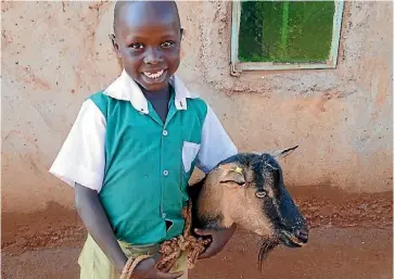  ?? PHOTO: CHILDFUND NZ/SUPPLIED ?? Robert, from Kenya, with his goat.