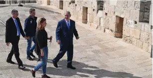  ??  ?? PRIME MINISTER Benjamin Netanyahu and Tourism Minister, Yariv Levin (left) yesterday welcome the 3,000,000th tourist to Israel, Romanian Ioana Isac, and her partner, Mihai Georgescu.