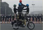  ??  ?? BSF women bikers rehearse for the forthcomin­g Republic Day parade at Rajpath on Wednesday.