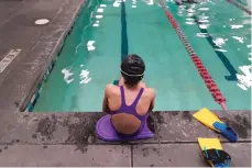  ?? RICK BOWMER/ASSOCIATED PRESS ?? A proposed ban on transgende­r athletes playing female school sports in Utah would affect girls like this 12-year-old swimmer seen Monday at a pool in Utah. She cried when she heard about the proposal.