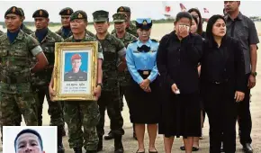 ?? — Reuters ?? Sorrowful send-off: An honour guard holding up a picture of Saman during a ceremony to transport his coffin at an airport in Rayong province. (Inset) Saman in a photo taken from social media.