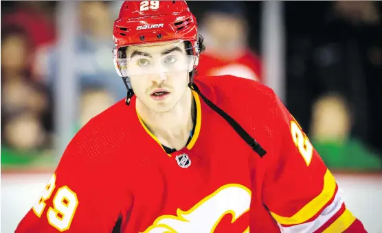  ?? PHOTOS: AL CHAREST ?? Flames forward Dillon Dube said his reassignme­nt to the AHL’s Stockton Heat is part of becoming a “top guy that plays in all situations.”