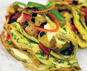  ?? STUFF ?? An omelette filled with vegetables and herbs is a great gluten-free breakfast.