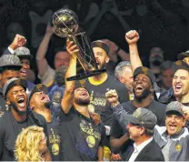  ?? Justin K. Aller / Getty Images ?? Soon after the Warriors won their third NBA title in four years, the discussion turned to LeBron James and his future.