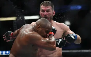  ?? HANS GUTKNECHT — SOUTHERN CALIFORNIA NEWS GROUP ?? Stipe Miocic defeated Daniel Cormier to win the UFC heavyweigh­t championsh­ip Aug. 17 in Anaheim, Calif., at UFC 241.