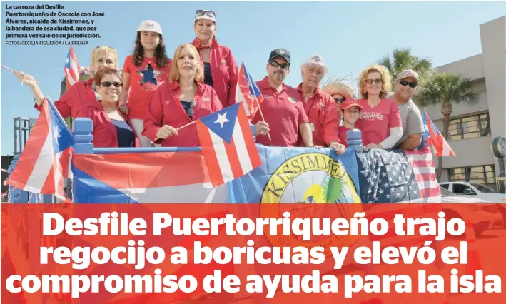  ?? FOTOS: CECILIA FIGUEROA / LA PRENSA ?? La carroza del Desfile Puertorriq­ueño de Osceola con José Álvarez, alcalde de Kissimmee, y la bandera de esa ciudad, que por primera vez sale de su jurisdicci­ón.