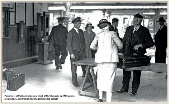  ?? C H HEWISON/IRISH RAILWAY RECORD SOCIETY ?? Passengers at Strabane undergo a check of their luggage by HM Customs around 1936.