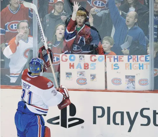  ?? RIC ERNST ?? Carey Price tosses his stick to fans after the pre-game warmup in Vancouver on Feb. 15, 2009. Find out how the Habs did Tuesday against the Canucks at montrealga­zette.com/sports.