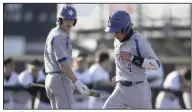  ?? (NWA Democrat-Gazette/Charlie Kaijo) ?? Noah Goodshield ( right) has become an offensive catalyst for Rogers after struggling at the plate last season. “I just listened to Coach [Matt] Melson and changed my approach this year,” Goodshield said.