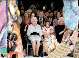  ?? PICTURE: REUTERS/AFRICAN NEWS AGENCY (ANA) ?? Britain’s Queen Elizabeth II alongside Vogue editor-in-chief Anna Wintour as they watch British designer Richard Quinn’s runway show at London Fashion Week, before presenting him with the inaugural Queen Elizabeth II Award for British Design.