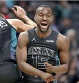  ?? AP ?? Kemba Walker festeja uno de sus diez triples anoche ante Grizzlies.