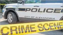  ?? Paul J. Richards AFP/Getty Images ?? A POLICE CAR secures the crime scene near a baseball field after Wednesday’s shooting in Alexandria, Va.