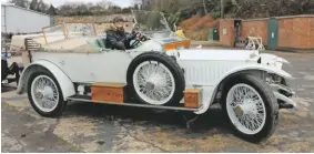  ??  ?? ‘Can I borrow the car dad?’ Katie Forrest having a great time with her dad’s 1912 Rolls-Royce Silver Ghost.