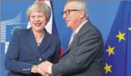  ??  ?? European Commission President Jean-claude Juncker, welcomes Theresa May in Brussels yesterday