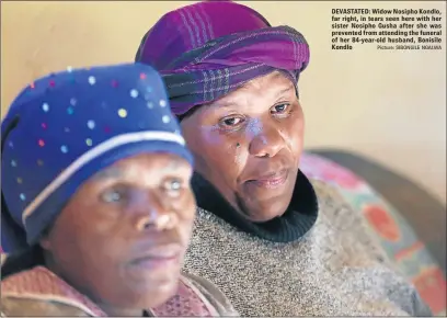  ?? Picture: SIBONGILE NGALWA ?? DEVASTATED: Widow Nosipho Kondlo, far right, in tears seen here with her sister Nosipho Gusha after she was prevented from attending the funeral of her 84-year-old husband, Bonisile Kondlo