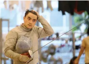  ?? VNA/VNS Photo ?? CHAMPION SWORDSMAN: Vietnamese fencer Vũ Thành An feels pressure but will work for a strong push at the 31st SEA Games on home turf.