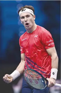  ?? — AFP ?? Norway’s Casper Ruud celebrates winning a point in the third set’s tie-break during his round-robin match against USA’S Taylor Fritz at the ATP Finals tournament in Turin.
