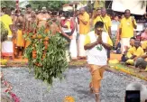  ?? Photo: SUPPLIED ?? Devotees of India Sanmarga Ikya (TISI) Sangam during the firewalkin­g ceremony.