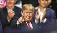  ?? Joe Raedle / Getty Images ?? President Donald Trump, shown at a rally Tuesday night in Florida, has lambasted the Koch brothers for cutting political donations to the Republican Party.