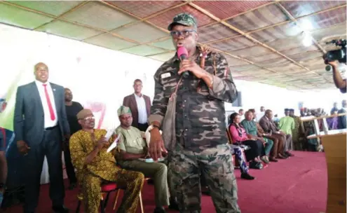  ??  ?? Governor Ayodele Fayose addresses hunters during a meeting with local hunters from the 16 local government areas of the state in Ado-Ekiti yesterday, where he charged them to secure the state against herdsmen invasion