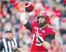  ?? AL CHAREST ?? Calgary Stampeders quarterbac­k Bo Levi Mitchell didn’t have to deal with many threats from the Hamilton Tiger-Cats defence, thanks to a strong performanc­e from the offensive line in Sunday’s 30-24 win.