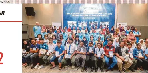  ?? PIC BY MUHD ZAABA ZAKERIA ?? Eco World Foundation chairman Tan Sri Lee Lam Thye (seated, third row, centre) with award recipients at the Eco World Bukit Bintang City Centre in Kuala Lumpur yesterday. With them are Eco World Developmen­t Group Bhd executive director Datuk Voon Tin Yow (seated, third row, sixth from left) and Eco World Malaysia president and chief executive officer Datuk Chang Khim Wah (seated, third row, sixth from right).