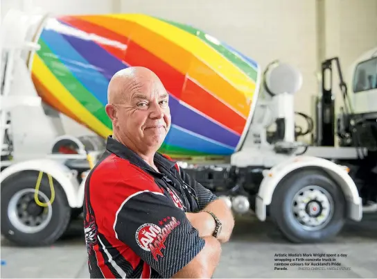  ?? PHOTO: CHRISTEL YARDLEY/STUFF ?? Artistic Media’s Mark Wright spent a day wrapping a Firth concrete truck in rainbow colours for Auckland’s Pride Parade.