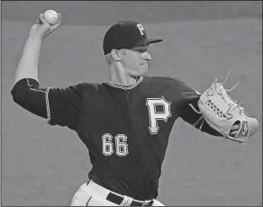  ?? Associated Press ?? Major League import: Pittsburgh Pirates relief pitcher Dovydaus Neverauska­s, from Lithuania, makes his Major League debut in the eighth inning of a baseball game against the Chicago Cubs, in Pittsburgh.