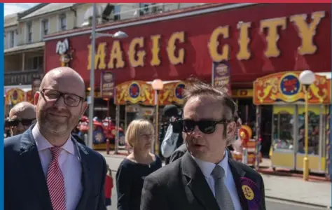  ?? CHRIS J. RATCLIFFE/AFP/GETTY IMAGES ?? U.K. Independen­ce Party leader Paul Nuttall, left, with Peter Oakley as they canvassed in Clacton-on-Sea, a pro-Brexit stronghold in eastern England.