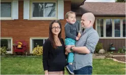  ?? JULIE JOCSAK TORSTAR ?? Tamara Kalagian-Haeni, with husband Alex and son John, is concerned she won’t get full maternity leave entitlemen­ts due to the COVID-19 pandemic.