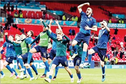  ?? AFP ?? Italy’s players celebrate their win after extra-time in the UEFA EURO 2020 round of 16 football match against Austria on Saturday.