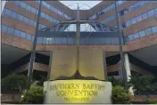  ?? HOLLY MEYER — THE ASSOCIATED PRESS ?? A cross and Bible sculpture stand outside the Southern Baptist Convention headquarte­rs in Nashville, Tenn., on May 24.