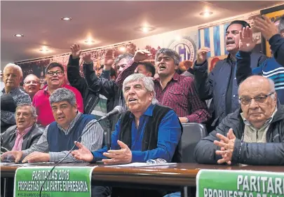  ?? L.zavattaro / télam ?? Pablo y Hugo Moyano, ayer, en la sede de Camioneros, donde anunciaron la protesta