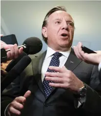  ?? JACQUES BOISSINOT/ THE CANADIAN PRESS ?? In Park Extension, where turbans and hijabs have abounded for decades, François Legault’s CAQ government’s proposed law was met with mixed responses.