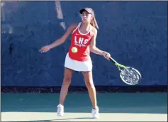  ?? MIKE BUSH/NEWS-SENTINEL ?? Lodi's Nikki Barajas gets ready to put a backhand on the tennis ball in a Tri-City Athletic League match against Tracy at the Twin Cities Athletic Club on Oct. 16.