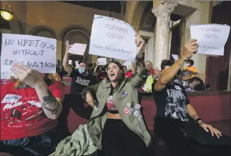  ?? Ringo H.W. Chiu Associated Press ?? A PROTEST is held at City Hall before the L.A. City Council meeting was canceled on Wednesday.