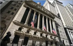  ?? ASSOCIATED PRESS ?? Stocks racked up more gains on Wall Street on Friday, as the S&P 500 had its best day in two years and just its second winning week in the last 12to provide a bit of relief from the market’s brutal sell-off this year.