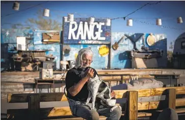  ?? Photograph­s by Allen J. Schaben Los Angeles Times ?? “BUILDER BILL” Ammon, a Slab City resident for 22 years, is eager to reopen his music venue, the Range.