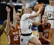  ?? ANDY CROSS — THE DENVER POST ?? Brynn Price of the Roosevelt Roughrider­s scores against Mead Mavericks’ Lexi Van Dyke (22), Caroline Kron (5) and Madi Clark (23) in the first quarter of the Class 5A Final Four game on Thursday at the Denver Coliseum.