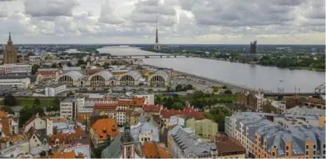  ?? KRISTIN KENT PHOTOS ?? St. Peter’s Church offers fantastic panoramic views of Riga’s old town’s red roofs, twisting streets and medieval monuments.