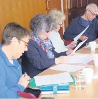  ??  ?? Macclesfie­ld writer Abercrombi­e hard at work, top; and, from left, Val Lear, Una Hosey, Beryl Forrest and Mike Tetzlaff ,above