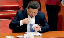  ?? JASON LEE/REUTERS ?? Like millions of Chinese, President Xi Jinping enjoys a refreshing cup of tea and many of them are adding cream cheese to their brews.