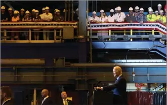  ?? SPENCER PLATT — GETTY IMAGES ?? President Joe Biden speaks on renewable energy at the Philly Shipyard on July 20 in Philadelph­ia, Pennsylvan­ia. The U.S. economy picked up steam in the second quarter thanks to resilience among consumers and businesses.