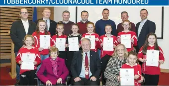  ??  ?? The Cathaoirle­ach and Council Members with the Tubbercurr­y-Clonnacool Community Games Champions