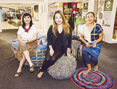  ??  ?? Celebratin­g Earth Month with the Coral Collection: SM SVP for marketing Millie Dizon, AVP for operations Bernice Baculi and Junk Not founder Wilhelmina Garcia. This new collection made of plastic waste materials and an old car tire is dedicated to marine life conservati­on.