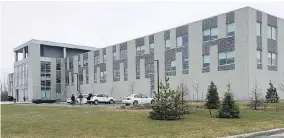  ?? MICHAEL MACDONALD / THE CANADIAN PRESS ?? The federal government says it has hired an extra 1,150 compensati­on employees at its main pay centre in Miramichi, N.B., above, and at regional satellite offices.