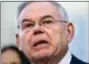  ?? SETH WENIG - THE ASSOCIATED PRESS ?? Democratic Sen. Bob Menendez becomes emotional as he speaks to reporters in front of the courthouse in Newark, N.J., Thursday. The federal bribery trial of Menendez ended in a mistrial Thursday when the jury said it was hopelessly deadlocked on all...