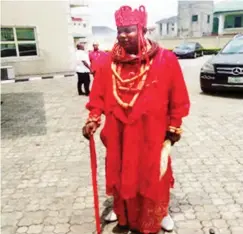  ??  ?? Pere of Iduwini standing outside his palace to be ushered out for ceremony
