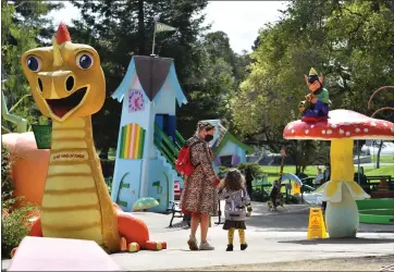  ?? JOSE CARLOS FAJARDO — STAFF PHOTOGRAPH­ER ?? Guests arrive to visit Children's Fairyland in Oakland on March 19, 2021. Children's Fairyland is one of the many amusements parks that influenced Walt Disney's creation of Disneyland.